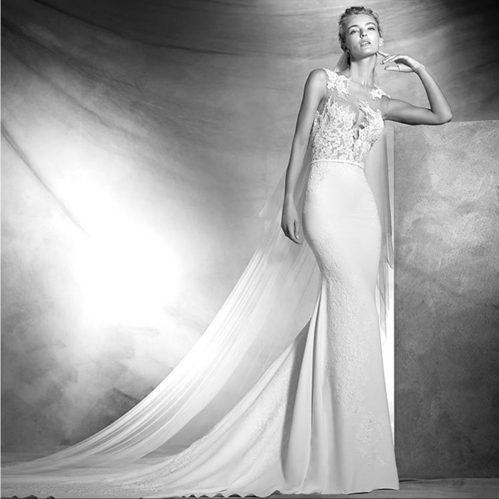 Timeless pronovias from Spain. Made of Chantelle lace and crepe material.